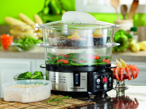 بخارپز چیست و چه کاربردهایی دارد؟ تصویر یک بخارپز برقی با غذای رژیمی